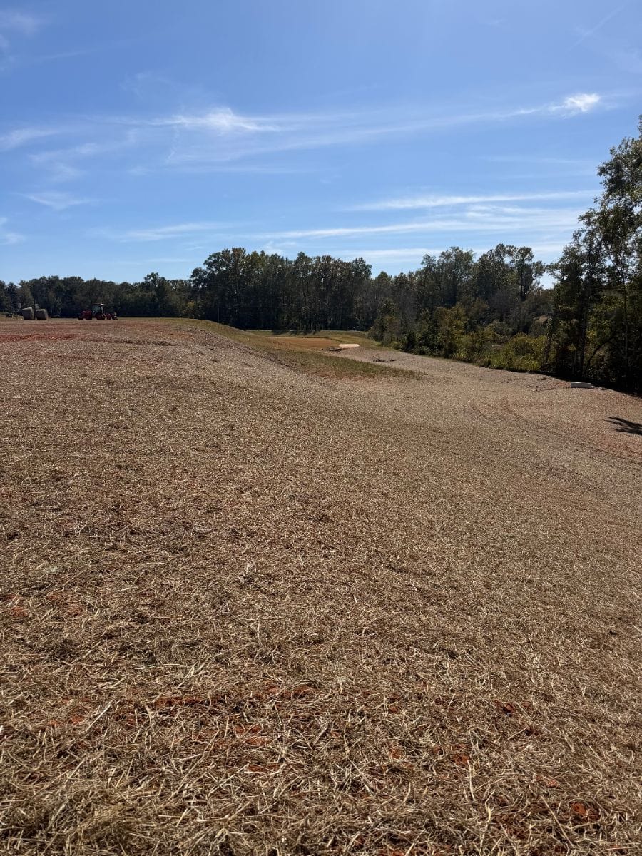 Finished slope seeded and covered in straw